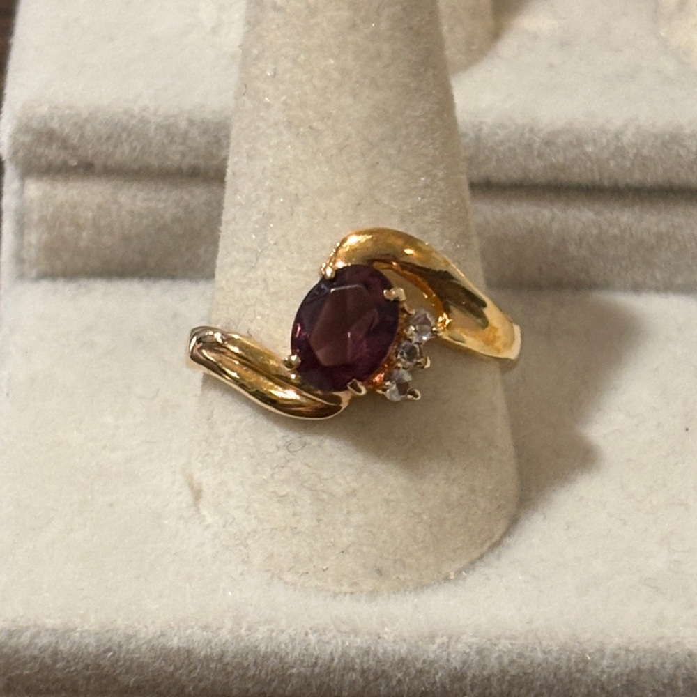 Gold Wavy Band Ring with 3 Small Clear + 1 Large Oval Purple Stone, Size 8.75